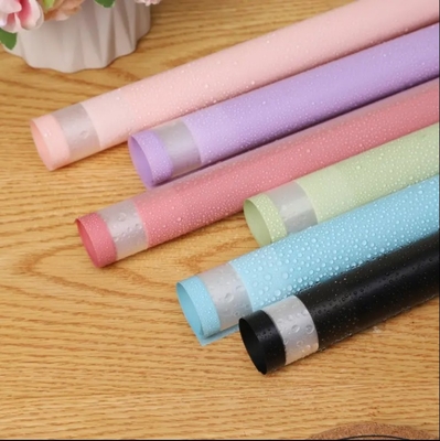 comprare Stile di moda semplice Carta di avvolgimento per fiori traslucida Cornice a colori Carta di fiori Fioristi Materiali di imballaggio all'ingrosso online manufacture