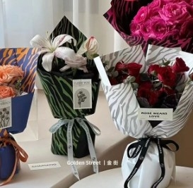 Un buon prezzo. Materiale floreale impermeabile a modello di zebra, carta da imballaggio di fiori freschi in linea