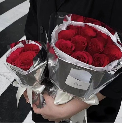 Un buon prezzo. Carta di avvolgimento a fiore con finitura speculare, carta lucida argentina, cellophane ispessito impermeabile, materiali di abbigliamento per bouquet e regali di fioraie in linea