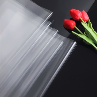 comprare Materiale di carta per avvolgimento di fiori in cellophane impermeabile a polvere OPP ad alta trasparenza, cellophane come base per i bouquet e cellophane per l'arte floreale online manufacture