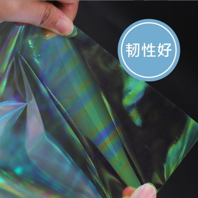 comprare Al dettaglio pellicola arcobaleno impermeabile, carta di vetro trasparente, carta a fiori, carta laser, materiale di carta per imballaggio di bouquet di fiori online manufacture