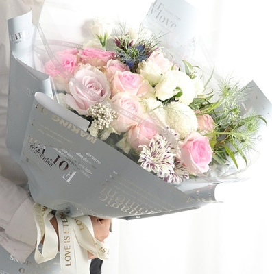 Un buon prezzo. carta da involucro per fiori di cellophane a 5,8 fili completamente trasparente, negozio di fiori materiali di arte floreale in linea