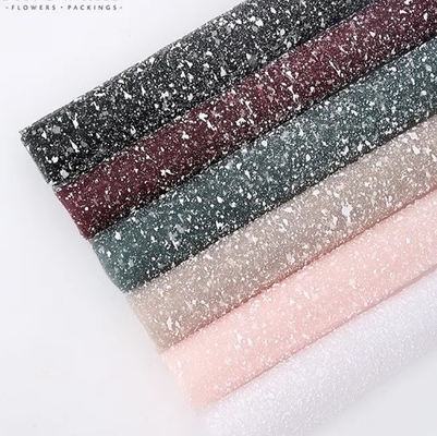 Buon prezzo Carta di avvolgimento a maglia di neve di design elegante in colori vivaci per imballaggi di fiori in linea