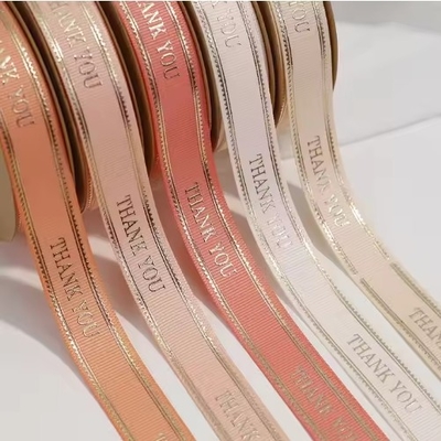 Un buon prezzo. Nastro personalizzato in poliestere in foglio d'oro con logo 3D per Natale e compleanno in linea