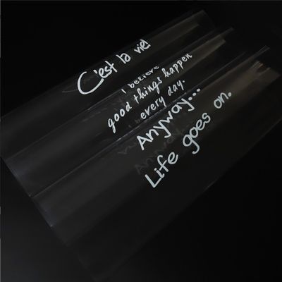 Un buon prezzo. 20 OPP addensate di carta da involucro trasparente impermeabile alla polvere con lettere inglesi e carta di vetro per fiori di rosa in linea