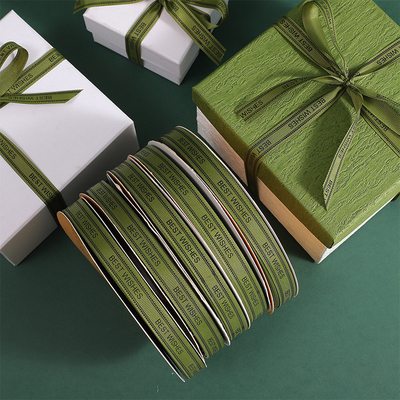 Un buon prezzo. Military green gift packaging ribbon letter ribbon gift box ribbon flower baking strap 1.5cm ribbon wholesale in linea