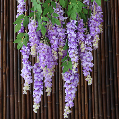 Un buon prezzo. Simulazione di fiori giganti di wisteria con rami lunghi, fiori finti di plastica, fiori di seta, soggiorno interno, strisce di rattan appese, decorazione fotografica in linea