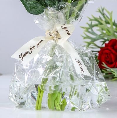 Un buon prezzo. Carta di avvolgimento impermeabile per fiori 70 fogli Fully Transparent Cellophane Prodotti di fioraio 52*52cm Molti colori in linea