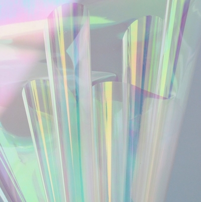Un buon prezzo. Cellophane arcobaleno e film laser per carta da regalo per bouquet di fiori aziendali in linea