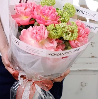 Un buon prezzo. Film OPP per fiori, cellophane, carta inglese, impermeabile bianca trasparente, carta di avvolgimento per bouquet trasparente, materiali da fioraio in linea