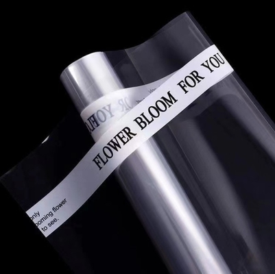 Un buon prezzo. Carta da regalo all'ingrosso, cellophane trasparente, materiale di imballaggio impermeabile per rivestimenti floreali, carta da regalo per bouquet in linea
