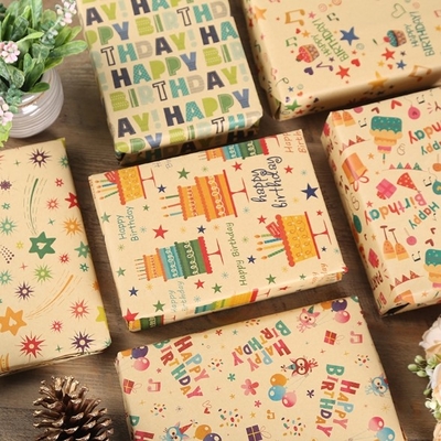 Un buon prezzo. L'involucro di regalo della carta kraft riveste 85gsm per lo spostamento di regalo della festa di compleanno in linea