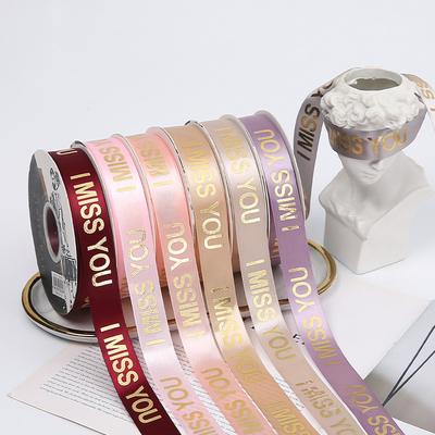 Un buon prezzo. Nastro del Grosgrain modellato nastro dell'involucro di regalo del raso di Rose Gold Pink Red 2.5cmX45Y in linea